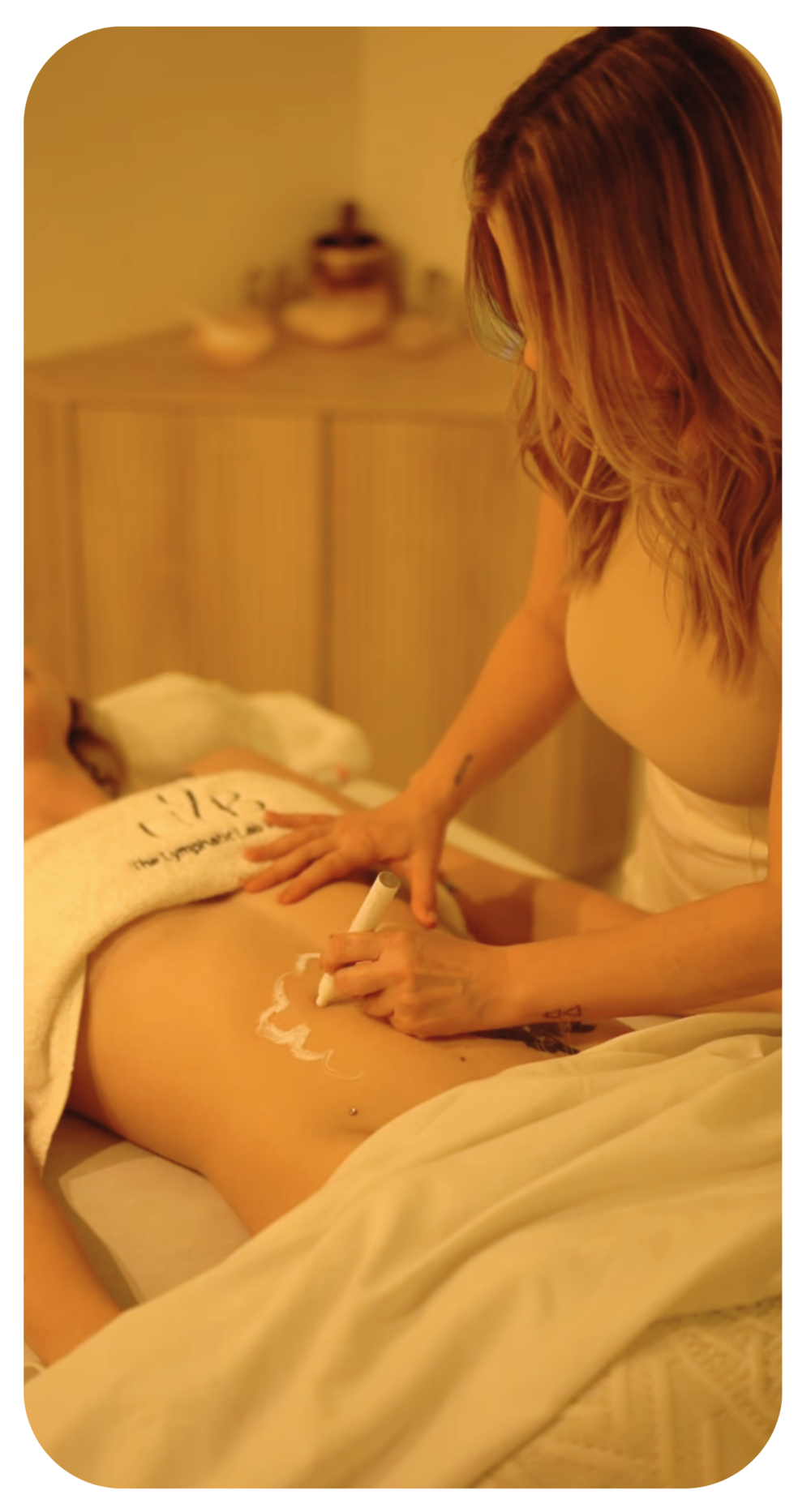 Therapist marking lymphatic drainage points